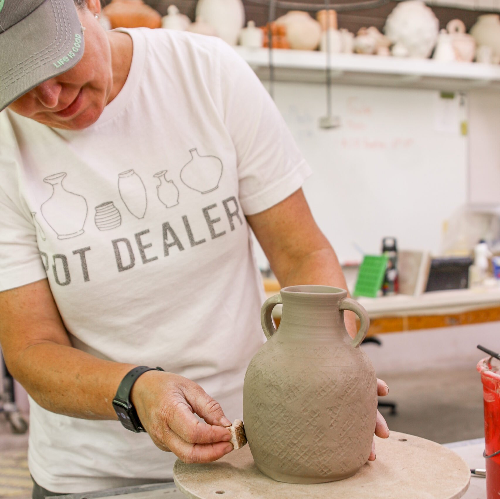 woman working with clay at the 2024 spring pentaculum